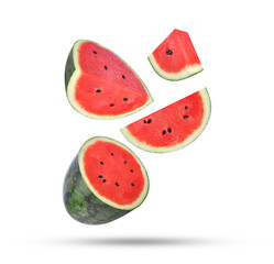 Slices of watermelon falling in the air isolated on white background.