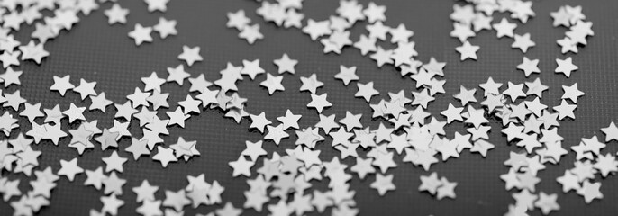 Texture with stars on black and white 