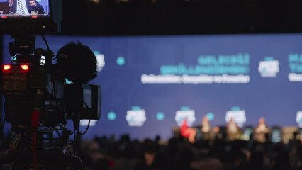 Video camera on the when shooting a television show. Live conference.