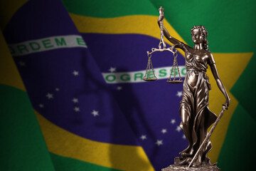 Brazil flag with statue of lady justice and judicial scales in dark room. Concept of judgement and...
