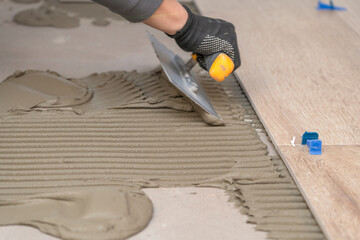 Laying tiles in the bathroom or kitchen