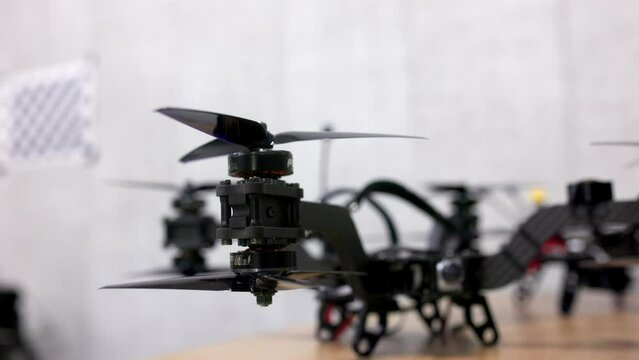 Drone racing multirotor quadcopter with remote control transmitter. Built by contributor contains no logos. Racing drone quadcopter multirotor