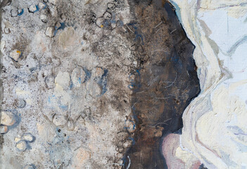 The girl lies in an earthen pit. A clothed woman with red hair. Oil painting portrait with biblical melancholic subject. Fragment of a painting with hands.