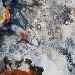 The girl lies in an earthen pit. A clothed woman with red hair. Oil painting portrait with biblical melancholic subject. Fragment of a painting with hands.