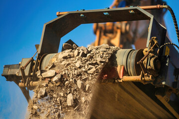 Close view of a rock crusher  - obrazy, fototapety, plakaty