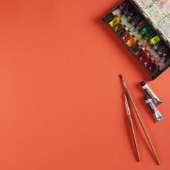 Paint and brushes on the table