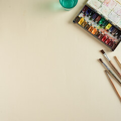 Paint and brushes on the table