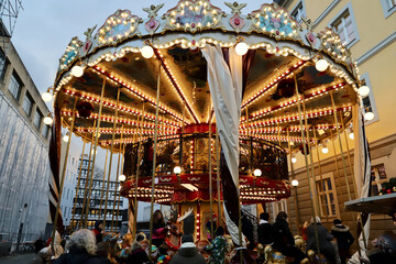 carousel at Christmas market - obrazy, fototapety, plakaty