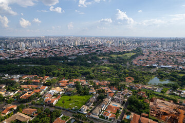 Fototapeta premium Alto Taquaral neighborhood in the interior of Campinas, São Paulo. Neighborhood with high standard houses, vegetation and houses under construction.