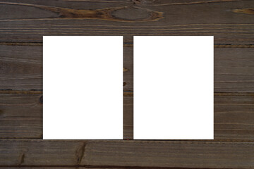 Double Sided Poster Mockup on Rustic Brown Wood Background with Copy Space