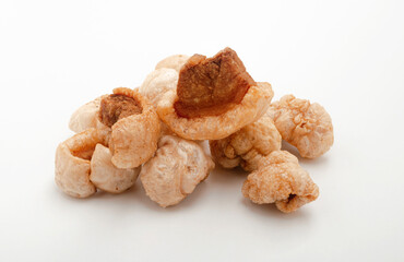 Crispy sliced pork skin snack food isolated on white background