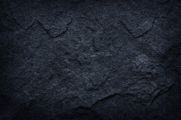 Dark grey stone / black slate stone background or texture