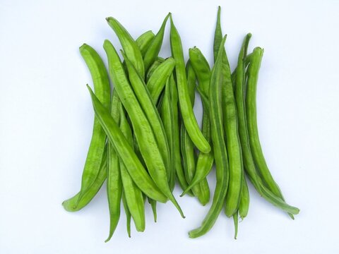 Fresh guar or cluster bean isolated on white background 