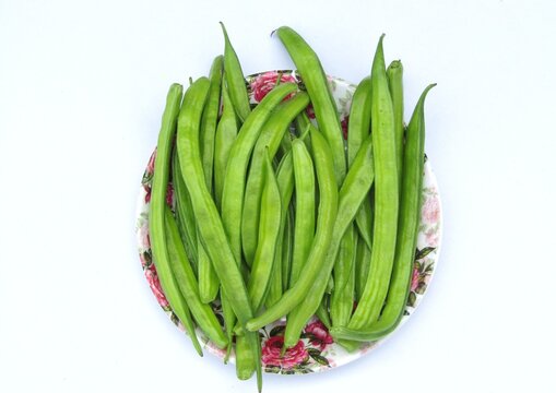 Fresh guar or cluster beans on a plate 
