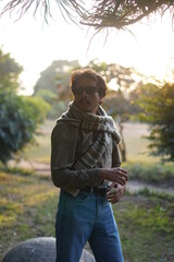 man wearing glasses under the roof of sun