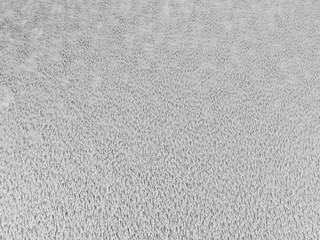 3D render of white hairy carpet texture, top view, copy space