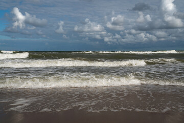 View of the incoming wave on the Baltic Sea on the shore of the Curonian Spit on a summer day, Kaliningrad region, Russia © Ula Ulachka