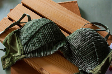 Close up shot of the green crochet patterns women push up bra. 