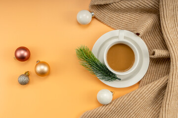 Obraz na płótnie Canvas Christmas decorations and coffee on yellow background. christmas concept.