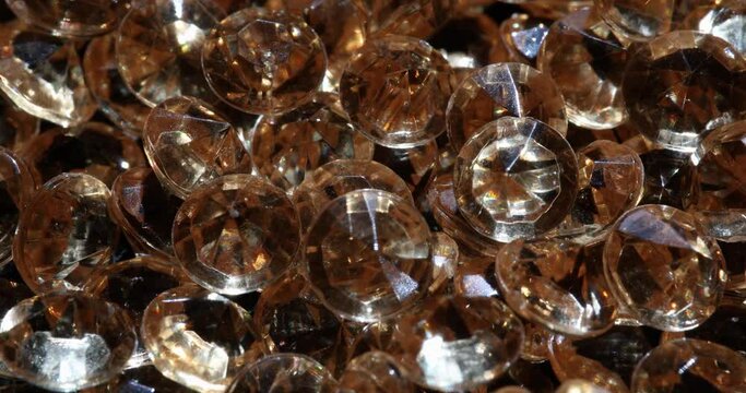 Closeup of many yellow round diamonds
