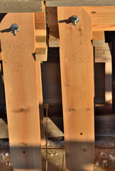 A fragment of a joiner's stand on a sunny winter day