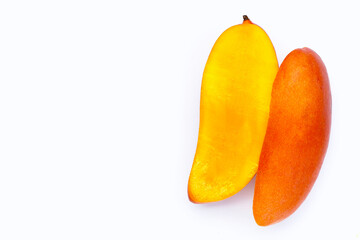 Mango fruit slices on white background.