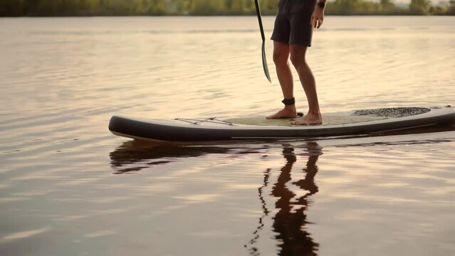 SUP board adventure. Fitness through stand-up paddleboarding