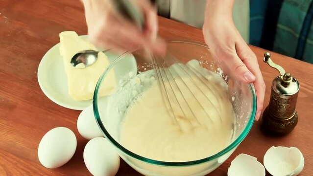 cooking a sponge cake . preparation of the dough	