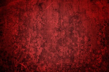 A textured background featuring deep red tones with a distressed, grunge appearance. The surface shows scratches and uneven patterns, creating a vintage feel.