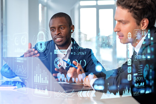 Two businessmen work together, global business statistics hologram