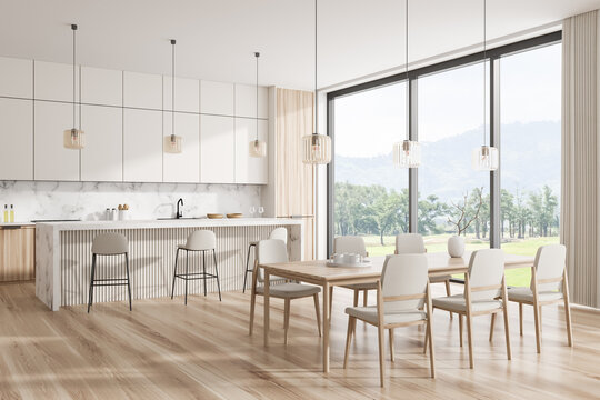 Corner view on bright kitchen room interior with dining table