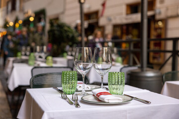 Fototapeta na wymiar Table setting at an outdoor restaurant, Rome, Italy