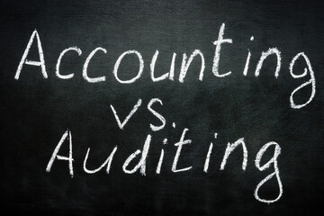 Accounting vs auditing inscription is written in chalk.