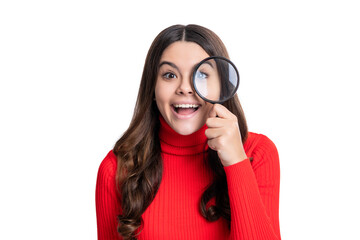 amazed curious teen girl hold magnifying glass isolated on white background.