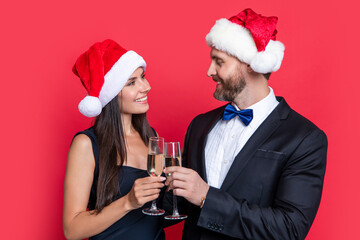 merry xmas to cheerful couple in studio. couple celebrate xmas. lets celebrate holiday. xmas couple