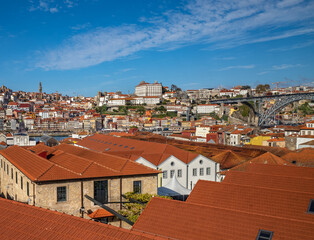  Red roofs of winery and Old town  on the Douro River. Portugal.
