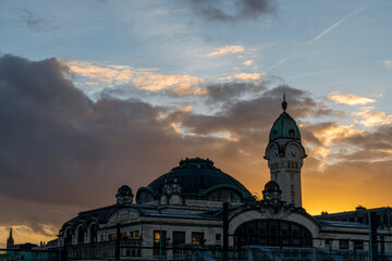 Limoges Benedictins Train station with sun behind tower, the most beautiful station in France 2022