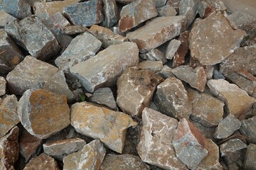 Heap of rough rock, different size, texture, pattern and color 