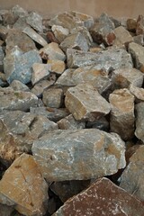 Variety and different size, texture, pattern and color of rough rock 