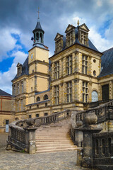 In front of Palace of Fontainebleau