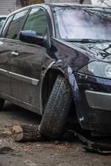 Fototapeta premium broken front wheel. broken car. The car after the accident