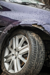 Fototapeta na wymiar broken front wheel. broken car. The car after the accident