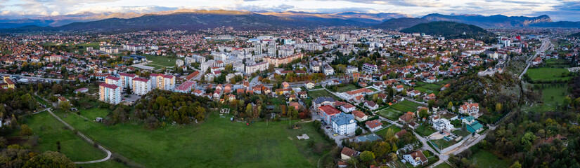 Fototapeta na wymiar Aerial view around the city Niksic in Montenegro on a late afternoon in autumn. 