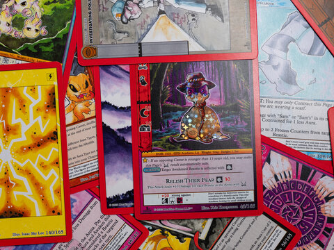 Hamburg, Germany - 11132022: Single MetaZoo TCG paper cards from the 2022 set Seance with nice art works.