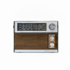 Retro radio receiver from the 70s. Front view. Isolated on white background. Traces of time and...