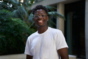 Portrait of black man very happy, smiling and looking at camera. An African American student...