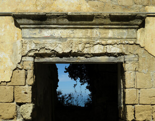 Detail of door in the dilapidated old prison in the Island of Procida. Campania. Italy.