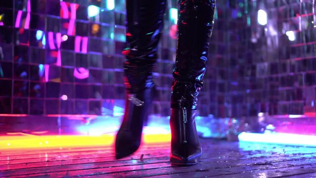 Woman dancing in a nightclub, women's shoes with high heels