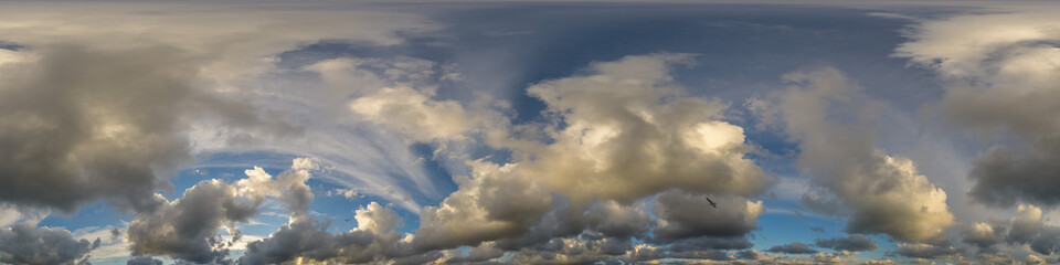 Dramatic sunset sky panorama with Cumulus clouds. Seamless hdr 360 pano in spherical equirectangular format. Complete zenith for 3D visualization, game and sky replacement for aerial drone panoramas
