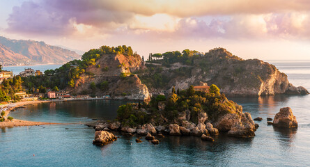 amazing view to a rocky coast and beautiful isle in sea with nice coasline and clouds on the background of the evening sea landscape - Powered by Adobe